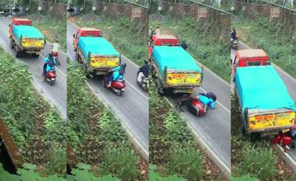 ലോറി  പിന്നിലേക്ക് നീങ്ങി പിറകേ വന്ന സ്കൂട്ടറിൽ ഇടിച്ചു; റോഡിലേക്ക് തെറിച്ച് വീണ യുവതിക്ക് അത്ഭുത രക്ഷ