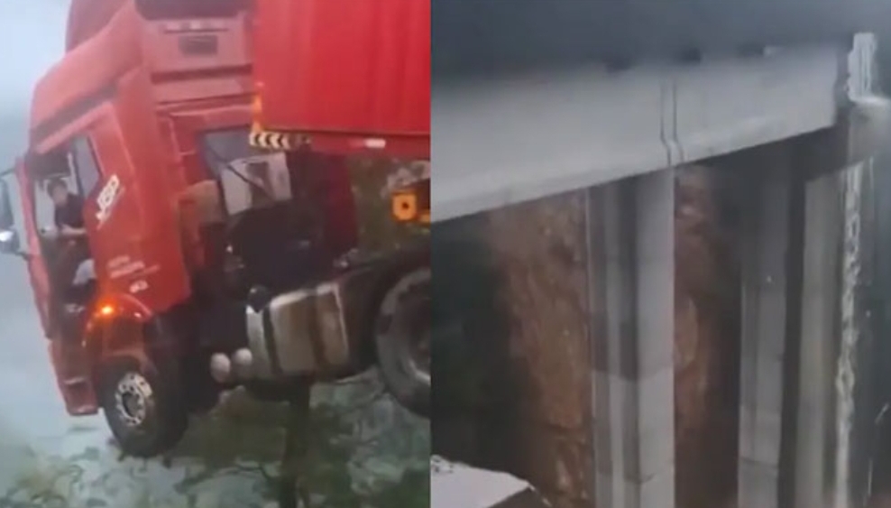 കനത്ത മഴയിലും മണ്ണിടിച്ചിലിലും തകർന്ന ഹൈവേ പാലത്തിൽ തൂങ്ങിക്കിടന്ന് ട്രക്ക്